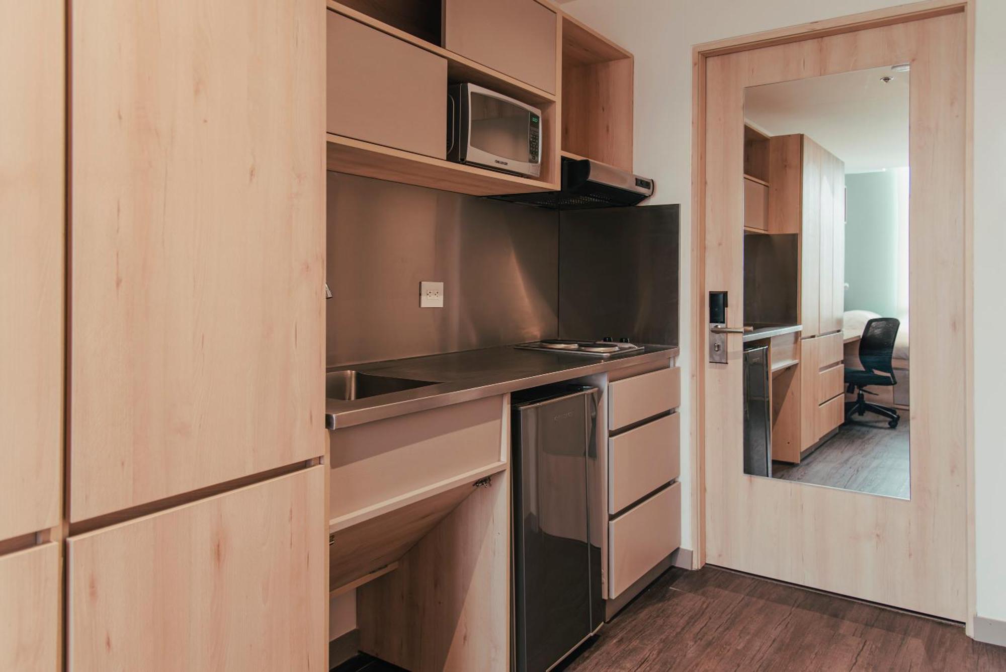 Uma Suites Чия Номер фото